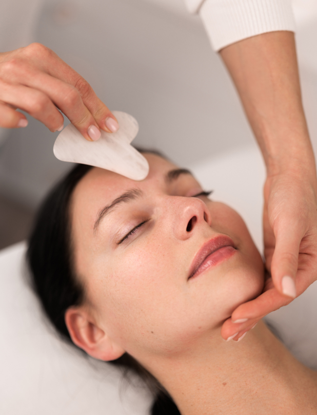 young-woman-during-gua-sha-chinese-traditional-mas-2023-11-27-04-58-23-utc Wellness Training Courses